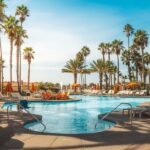 swimming pool near palm trees during daytime